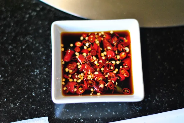 chili fish sauce, chilli fish sauce, sauce, side dishes. How do you tell a documented artisan condiment origin story from a marketing paragraph?
