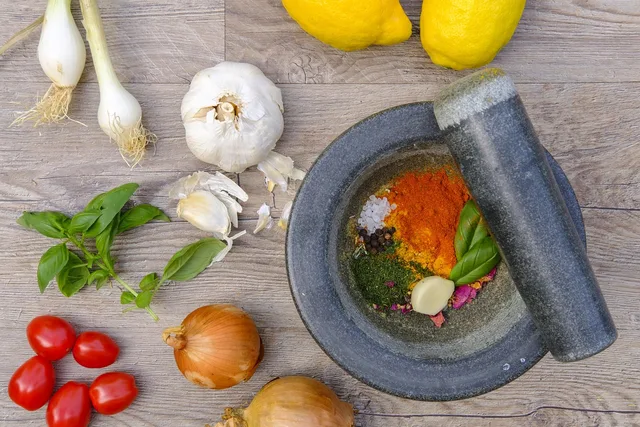 mortar, spices, spice mix, spice up, cook, prepare, garlic, basil, onion, tomato, lemon, salt, pepper, paprika, tamper, crush, mortar, mortar, mortar, mortar, mortar, garlic, garlic, garlic, basil, salt, crush. Two American spice blends, compared dose for dose at your own kitchen table