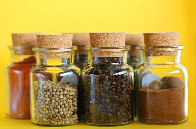 spices, kit, yellow background, jar, cup, container, spice, seasoning, bottle, grass, herbal, aromatic, pepper, lid, cooking, cayenne pepper, nature, chile. Moisture, heat and light: what actually degrades a seasoning blend