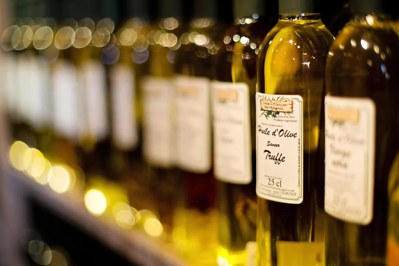 olive oil, truffle oil, mediterranean, gourmet, organic, condiment, delicacy, bottles, olive oil, olive oil, olive oil, olive oil, olive oil. What US sauce makers need for Canada, from bilingual labels to CFIA rules?